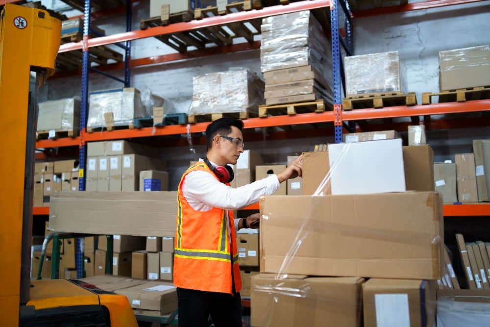 employee of a logistics warehouse takes an invento 2022 01 20 15 49 28 utc 1